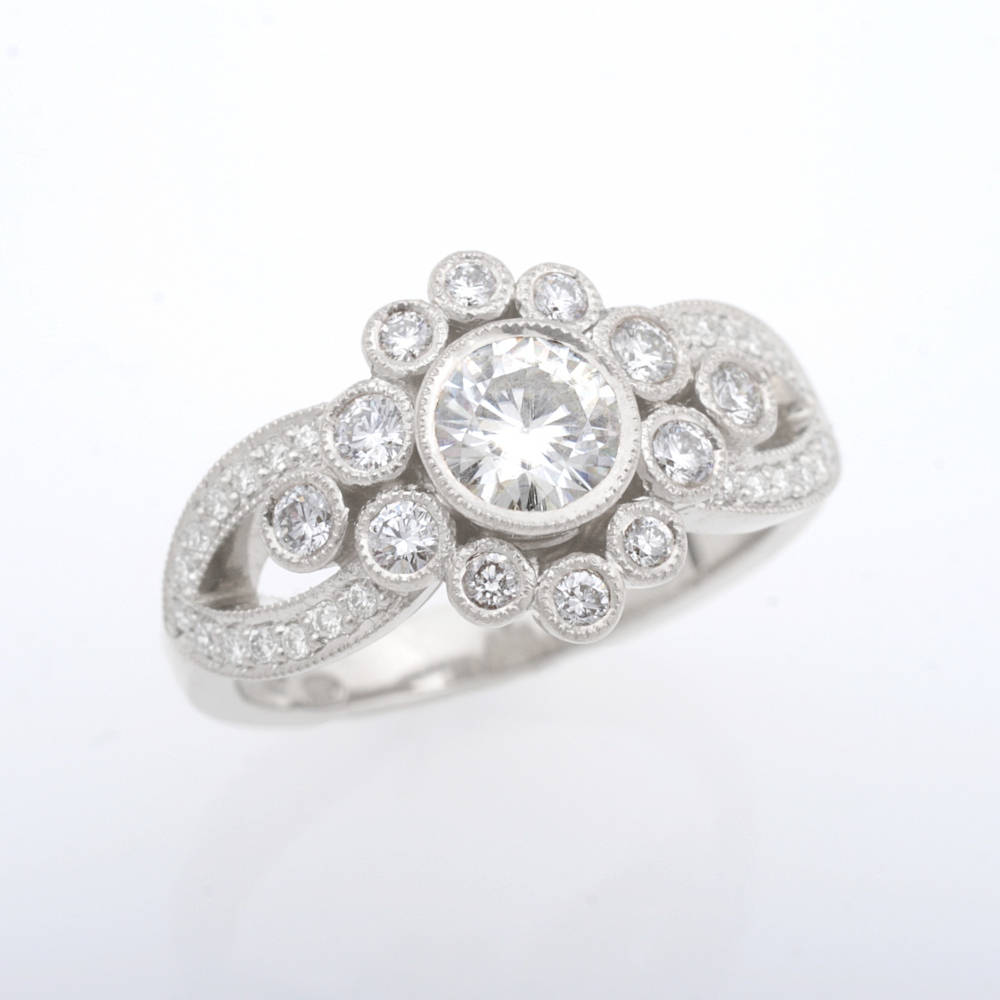 White gold diamond halo engagement ring.