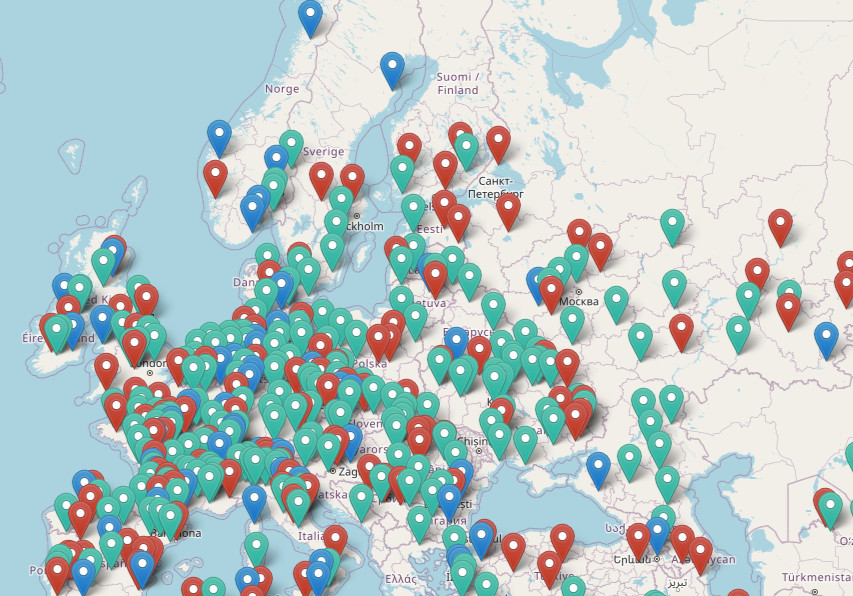 World map with blue, green and red markers.